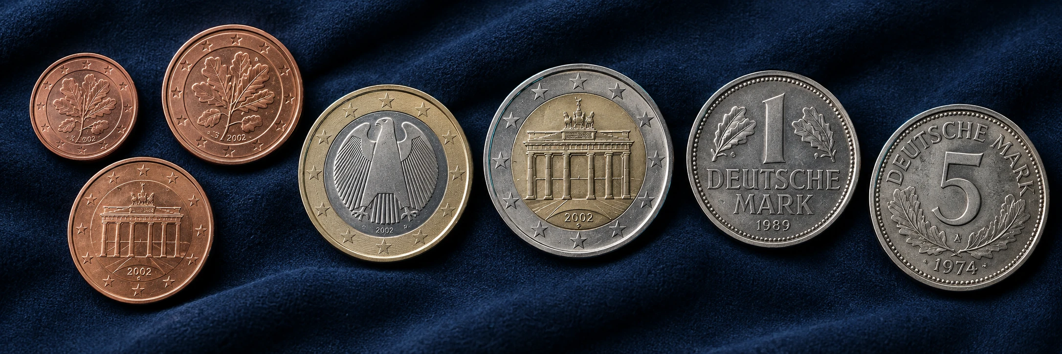 German euro and historic mark coins arranged for identification by currency family and national design