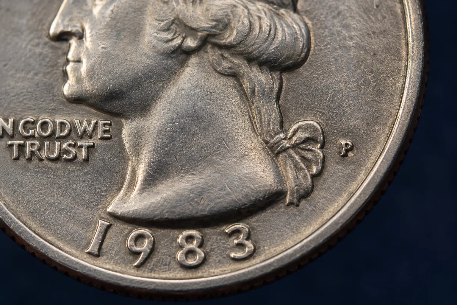 1983-P Washington quarter P mint mark macro below Washington neck