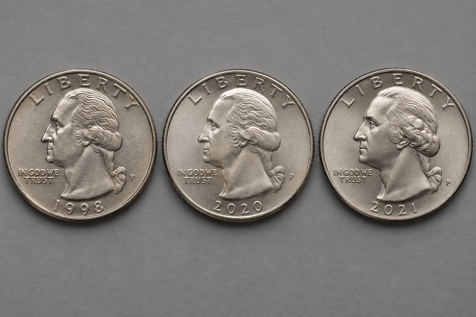 Editorial comparison of 1998 2020 and 2021 Washington quarter obverses